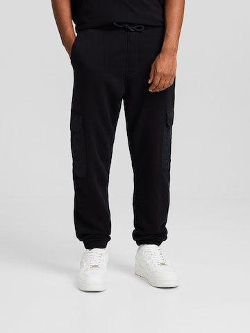 Effilé Pantalon cargo Bershka en noir : devant