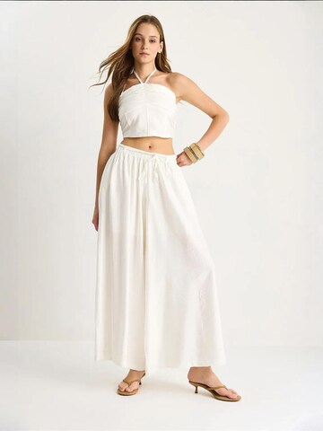 Pantalons de tailleur Bianco Lucci en blanc