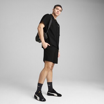 PUMA Comfort fit Functioneel shirt 'Wardrobe Ess' in Zwart