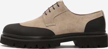 Kazar Lace-Up Shoes in Beige: front