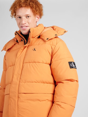 Calvin Klein Jeans Зимняя куртка в Оранжевый