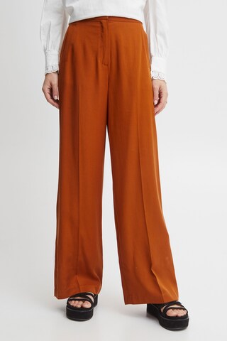 Atelier Rêve - Pierna ancha Pantalón de pinzas 'Lenni' en marrón: frente