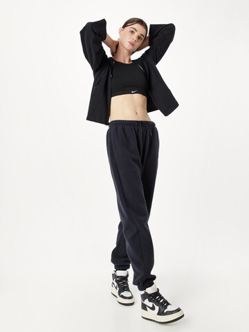 Nike Sportswear Tapered Trousers in Black