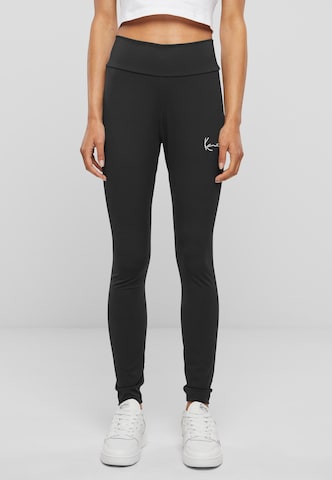 Skinny Leggings de la Karl Kani pe negru: față