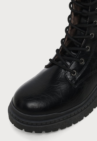 Botine de la MUSTANG pe negru