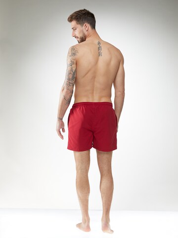 Pantaloncini da bagno 'MADDOX' di ABOUT YOU x Kevin Trapp in rosso