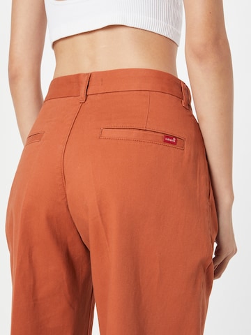 LEVI'S ® Свободный крой Плиссированные брюки 'Baggy Trouser' в Оранжевый