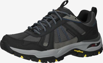 SKECHERS Boots in Black: front