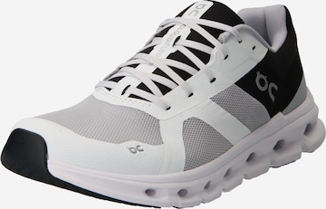 On Running shoe in Grey: front