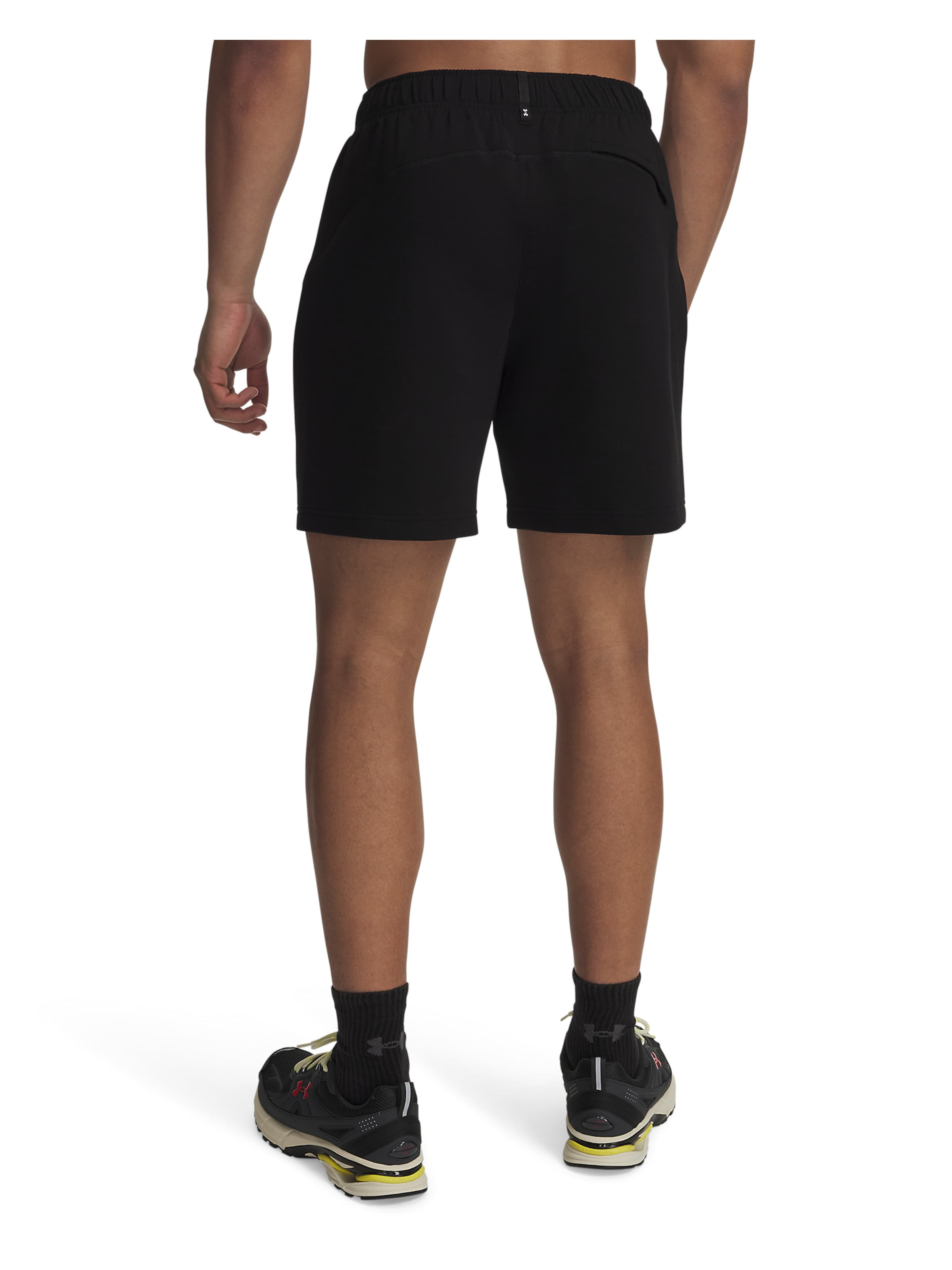UNDER ARMOUR Regular Sportbroek 'Unstoppable Flc' in Zwart