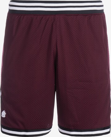 UNDER ARMOUR Loose fit Workout Pants 'Curry' in Red: front