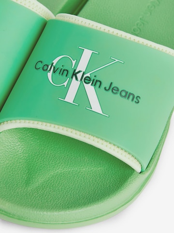 Claquettes / Tongs Calvin Klein Jeans en vert