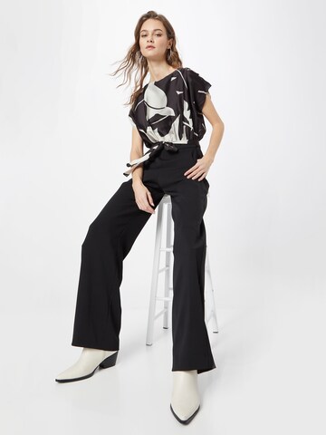 SWING Jumpsuit in Zwart