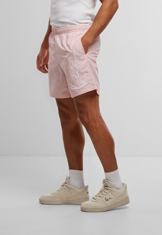 Shorts de bain Karl Kani en rose