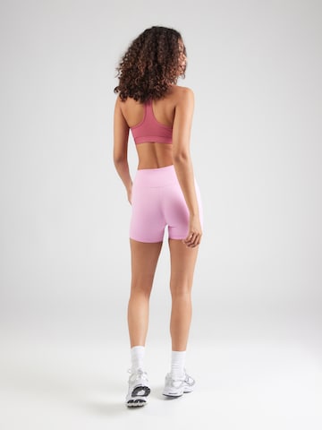 Skinny Pantalon de sport 'ONE' NIKE en rose