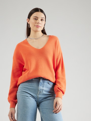 COMMA - Jersey en naranja: frente