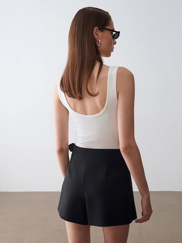 Haut Dilvin en blanc