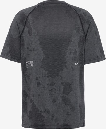 NIKE Funktionsshirt in Grau