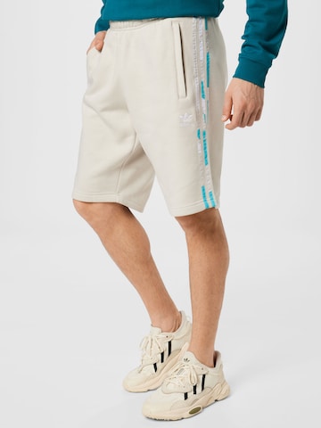 ADIDAS ORIGINALS Loose fit Pants 'Graphics Camo' in Beige: front