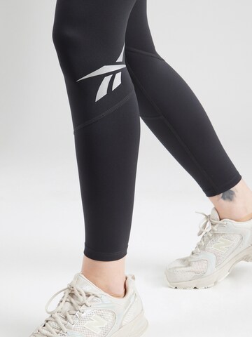 Reebok Skinny Sportovní kalhoty 'Running Vector' – černá