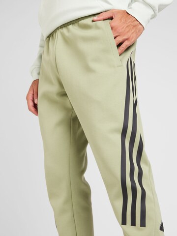 ADIDAS SPORTSWEAR Tapered Sports trousers 'Future Icons' in Green