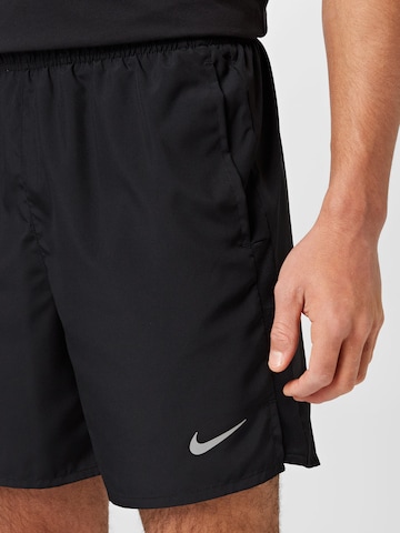 NIKE Regular Workout Pants 'Challenger' in Black