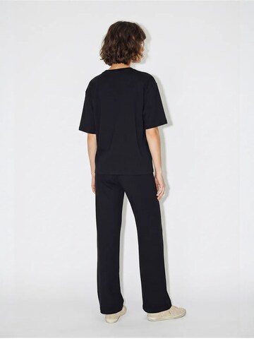 Pantalons de tailleur Bianco Lucci en noir
