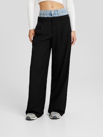 Bershka Zvonové kalhoty Kalhoty se sklady v pase – černá: přední strana