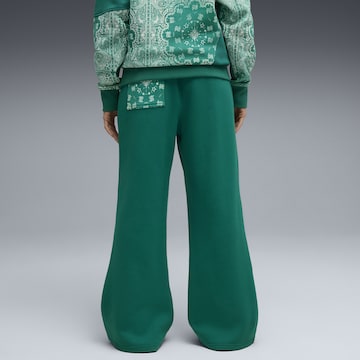 PUMA Wide leg Sportbroek 'Shooting Stars' in Groen