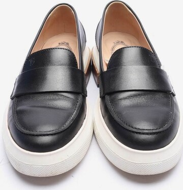 Tod's Flats & Loafers in 35 in Black