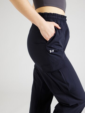 UNDER ARMOUR Tapered Sportbroek in Blauw