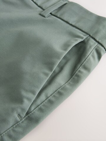 Slimfit Pantaloni chino di Next in verde