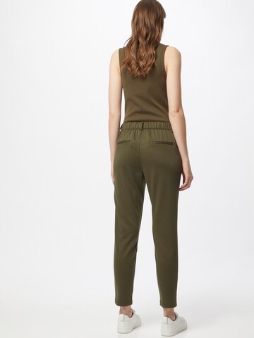 ESPRIT - Tapered Pantalón plisado en verde