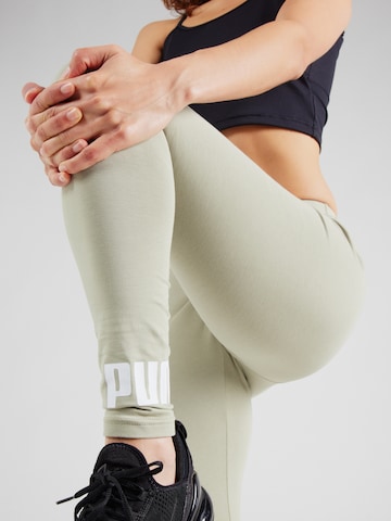 PUMA Skinny Sportbroek 'ESS No. 1' in Groen