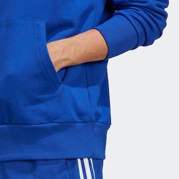 ADIDAS SPORTSWEAR Спортен блузон 'Essentials' в синьо