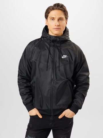 Nike Sportswear Prehodna jakna 'Windrunner' | črna barva: sprednja stran