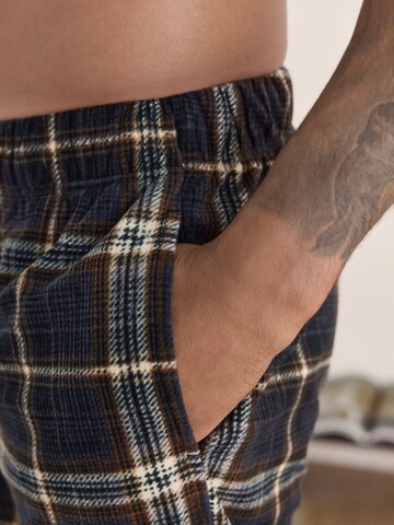 Pantaloncini da pigiama di Next in nero