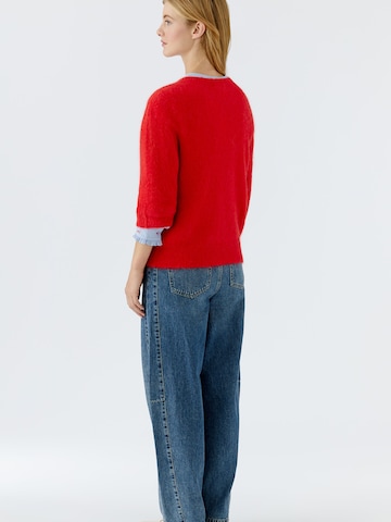 OUI Neulepaita värissä punainen