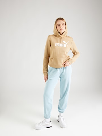 PUMA - Sweatshirt de desporto 'ESSENTIAL' em castanho