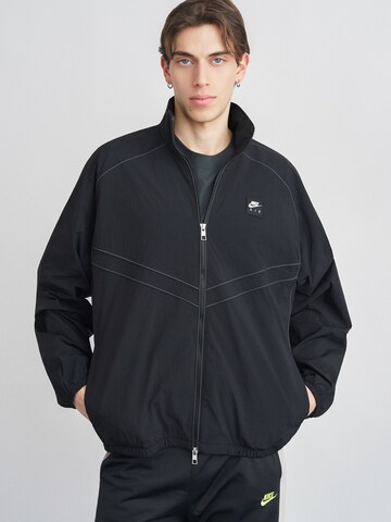 Veste mi-saison 'AIR' Nike Sportswear en noir