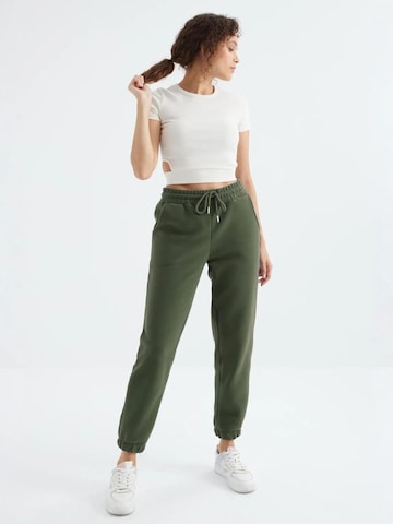 Regular Pantalon de sport Tommy Life en vert