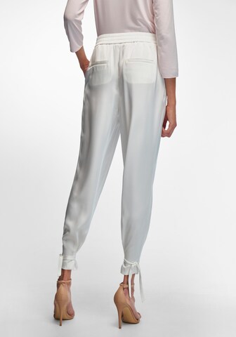 Effilé Pantalon TALBOT RUNHOF X PETER HAHN en blanc