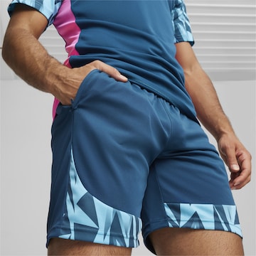 Regular Pantaloni sport 'Individual FINAL' de la PUMA pe albastru