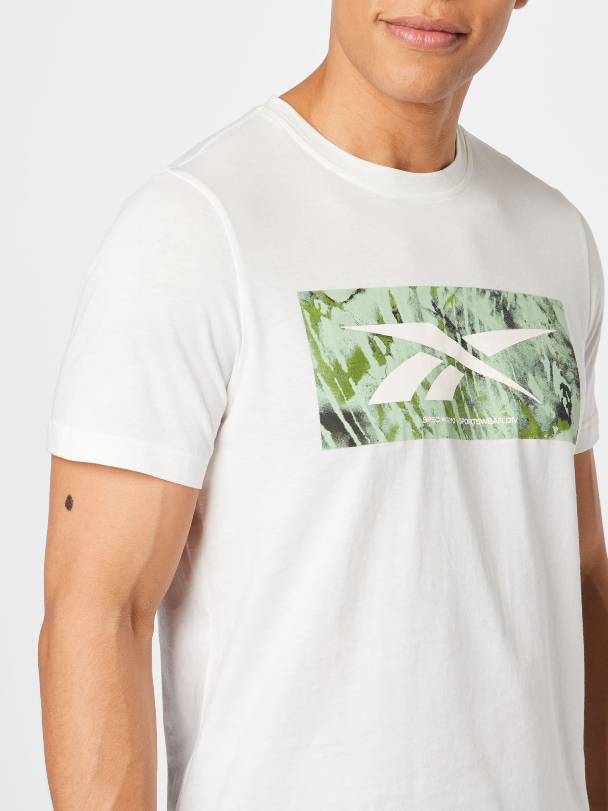 Homme T-Shirt fonctionnel Reebok Sport en Blanc Cassé 