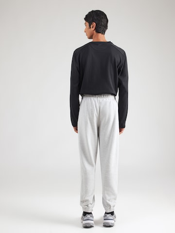 Tapered Pantaloni sport 'Orvinio' de la ELLESSE pe gri