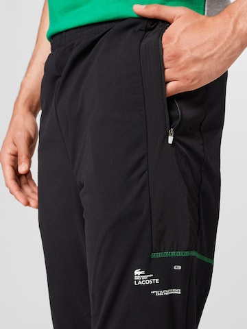 Effilé Pantalon de sport Lacoste Sport en noir