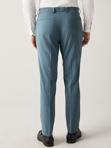 Slimfit Pantaloni chino 'Motionflex' di Next in blu