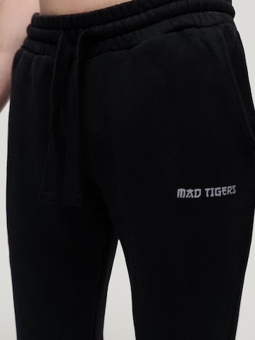 MAD TIGERS Wide leg Trousers in Black