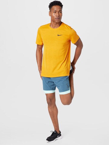 NIKE Performance shirt 'Superset' in Yellow