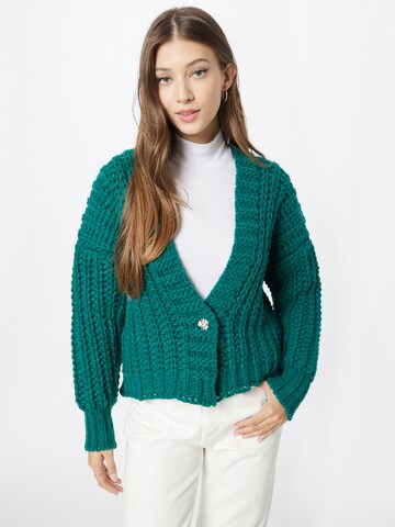Geacă tricotată de la POM Amsterdam pe verde: față